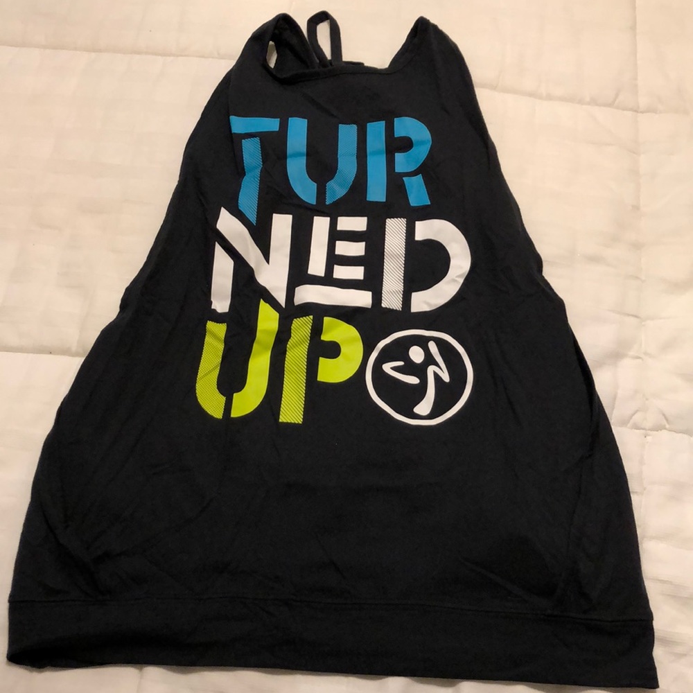 Zumba Instructor Turned up top Size M. Open sides.